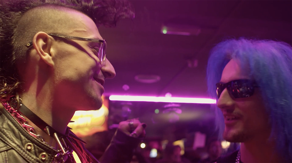 Two London ravers smiling and chatting